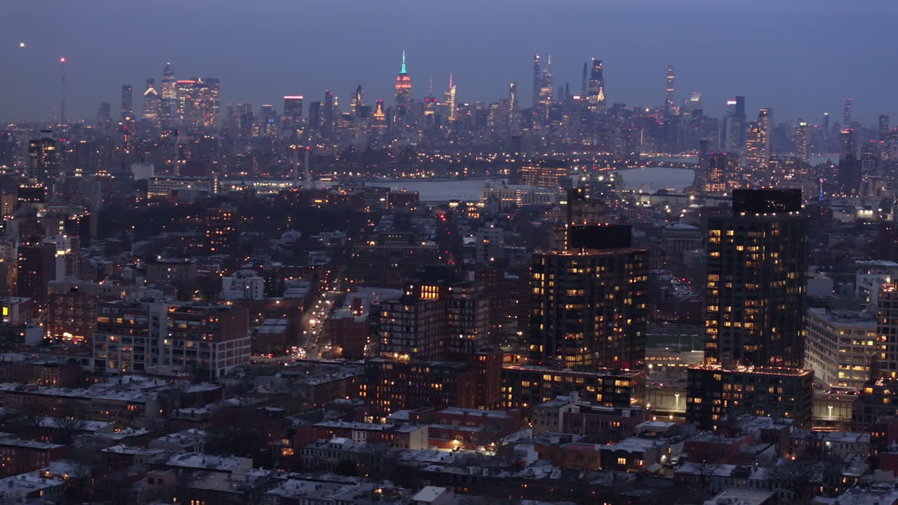 Aerial view of New York City at night. Shot in Brooklyn looking towards Midtown Manhattan.
