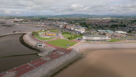 seaside town headland in sunshine. proposed site for eden project. summer. marine road central, morecambe, lancashire, uk