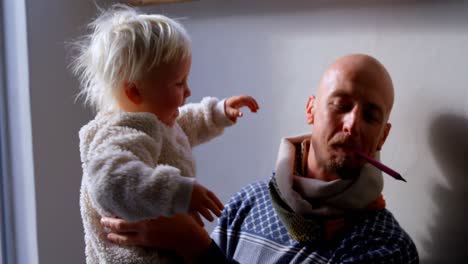 father and daughter playing together 4k