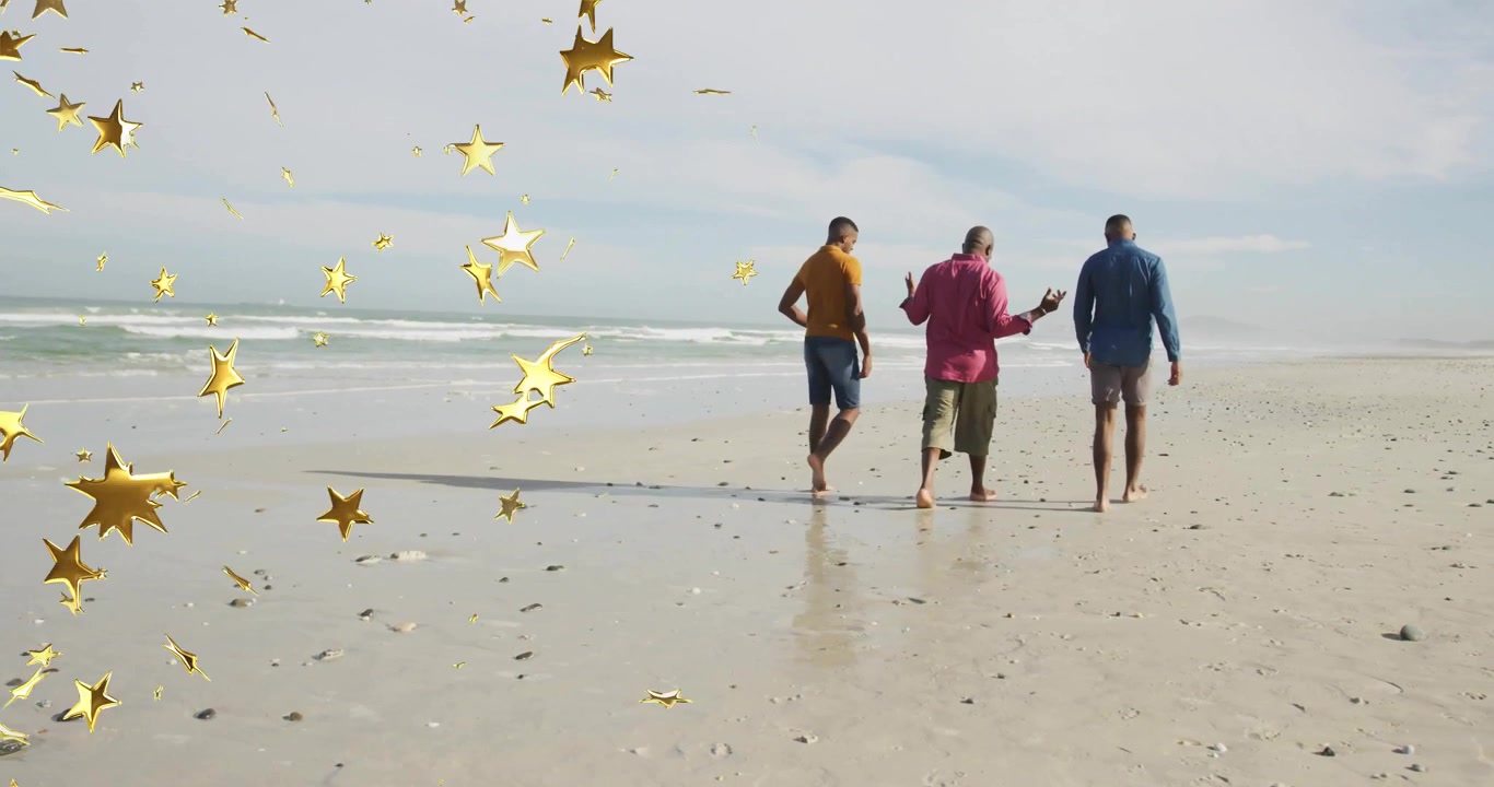 Senior man and two adult men walking barefoot along beach for health, with floating golden stars