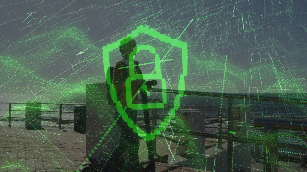 Green digital security shield animation over person standing near waterfront railing