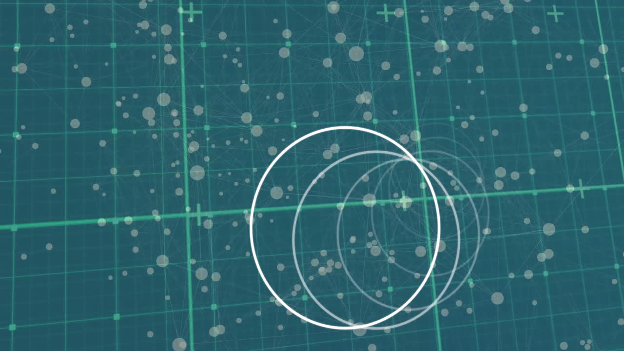 Animation of circles moving and spots over grid on green background