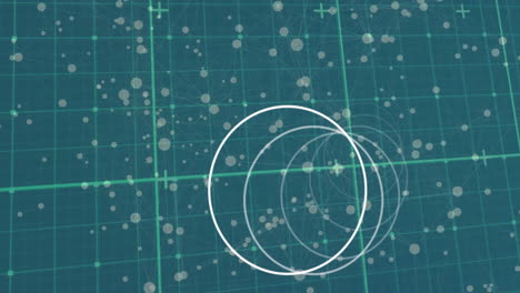animation of circles moving and spots over grid on green background