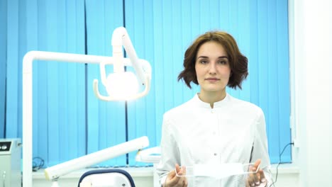 female dentist/doctor in a protective mask