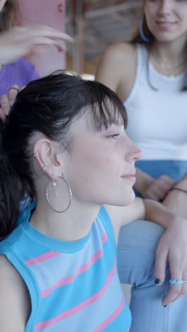 young woman getting her hair styled