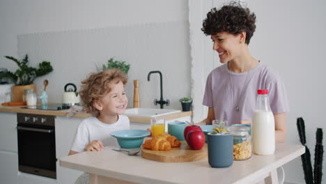 mother and son enjoying breakfast
