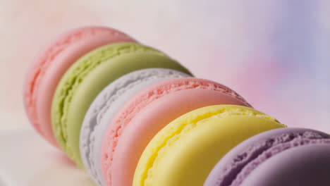 colorful pastel macarons stacked in a row