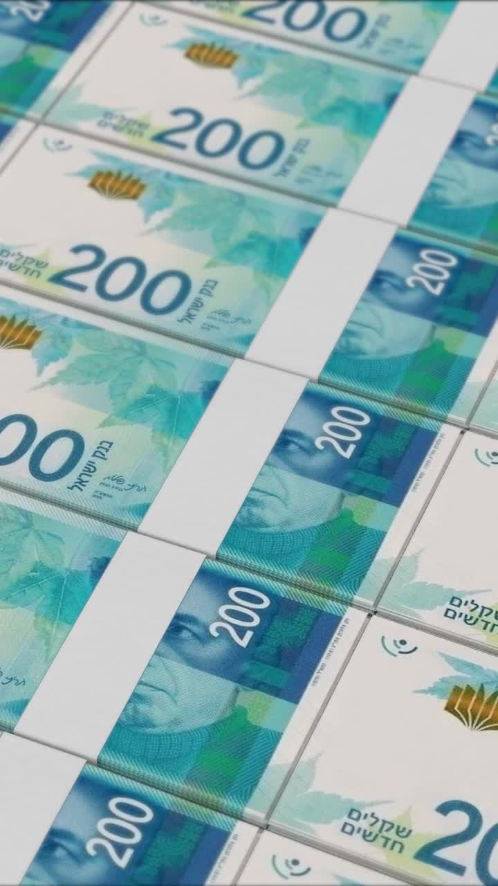 Vertikales Video von 200 Israelischen Neuen Schekel Banknoten, die von einer Geldpresse gedruckt werden
