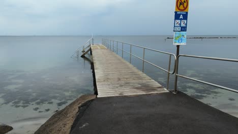 a walk along a small pier near on a moody day near sibbarp, malmo, sweden