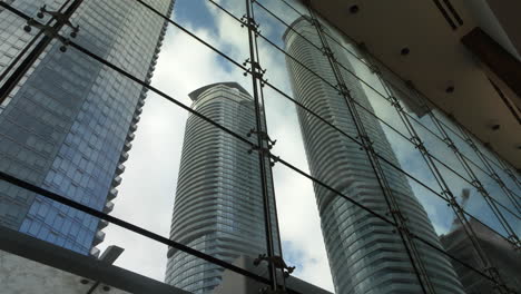 smooth motion shot looking up at city buildings in toronto