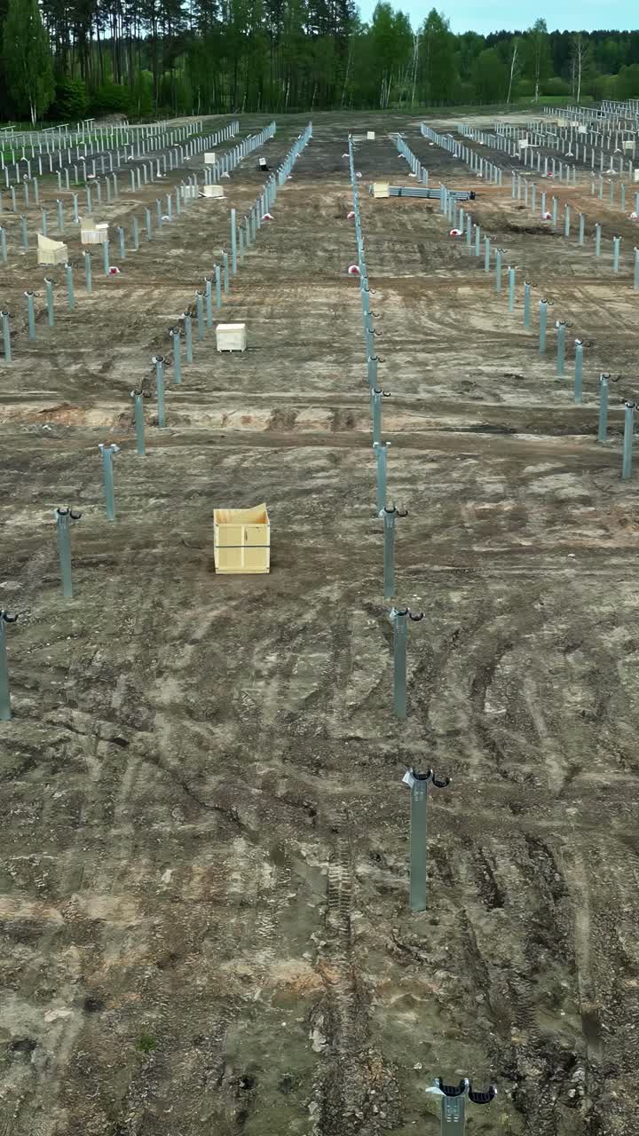 Aerial vertical view of solar farm installation work in progress in Latvia