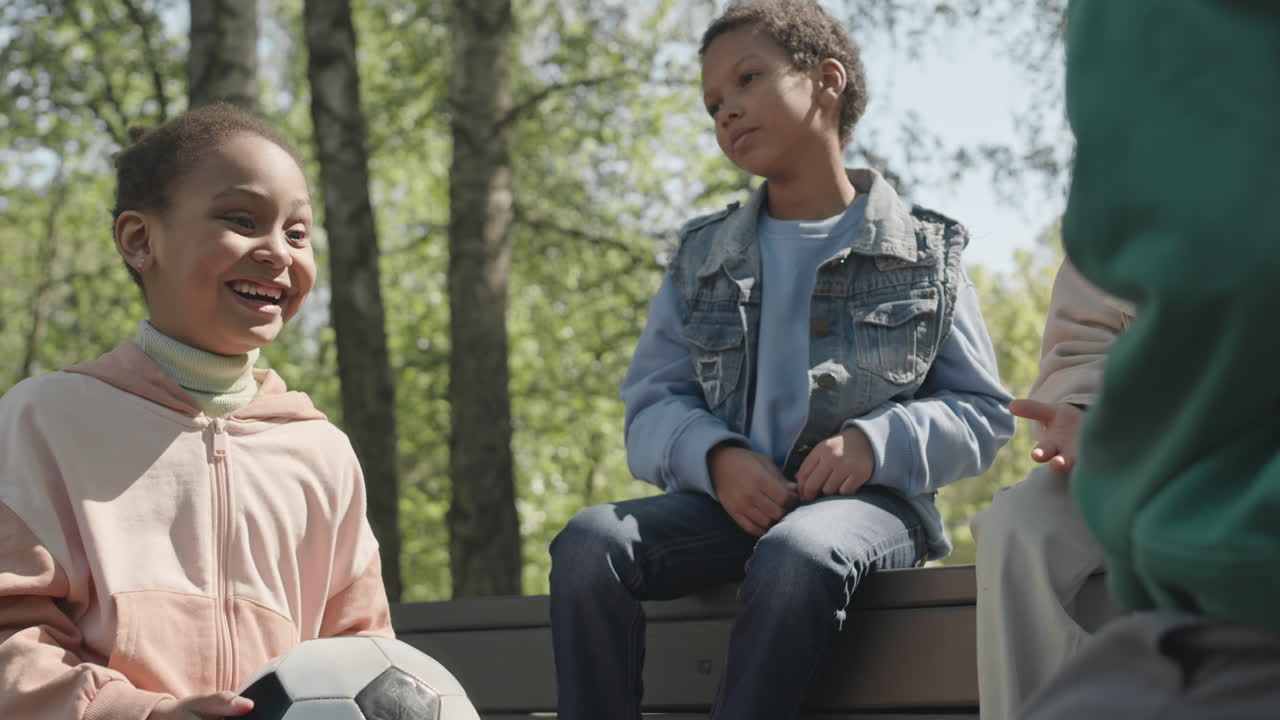 Little Kids Chatting while Spending Day in Park