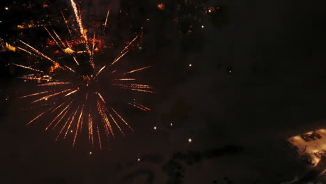 Aerial-of-fireworks-celebration-above-ski-resort