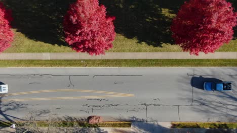 Overhead-aerial-shot-of-traffic-on-quiet-street