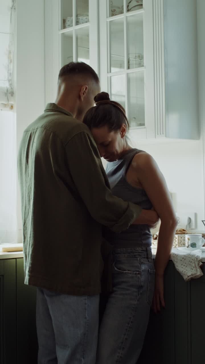 Couple Hugging in Kitchen