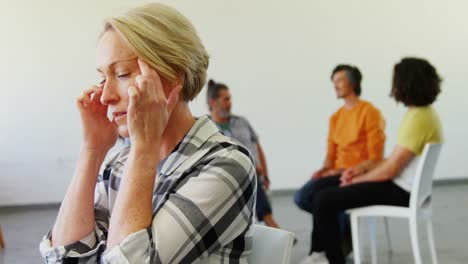 woman suffering from headache 4k