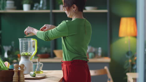 woman cooking healthy food in kitchen