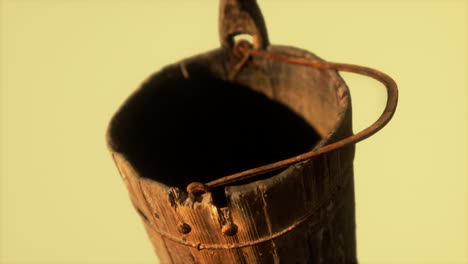 Old-used-rusted-wooden-bucket