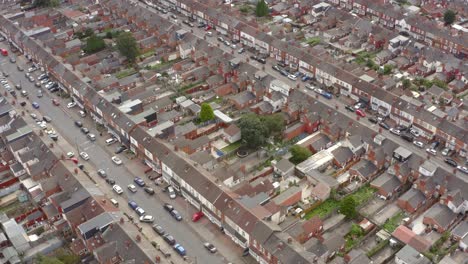 drone shot circling over birmingham housing estate streets