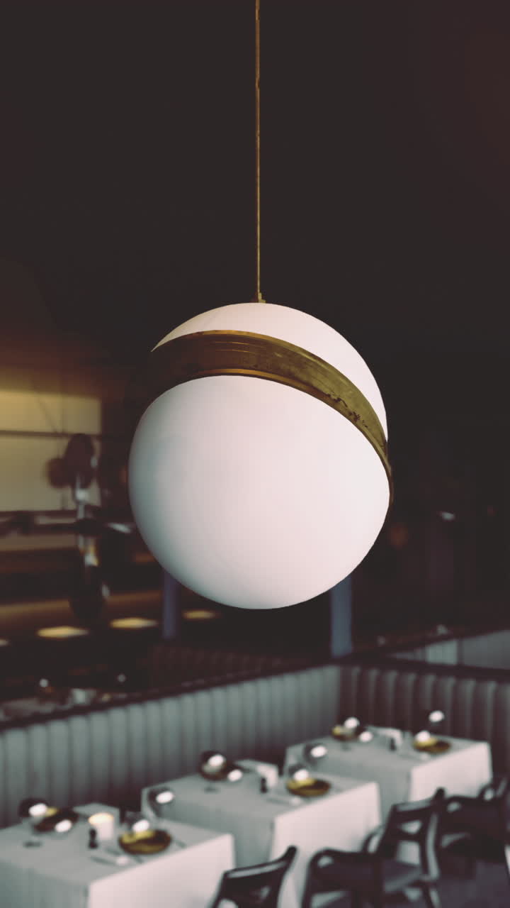 Modern restaurant interior with unique pendant lighting and elegant decor