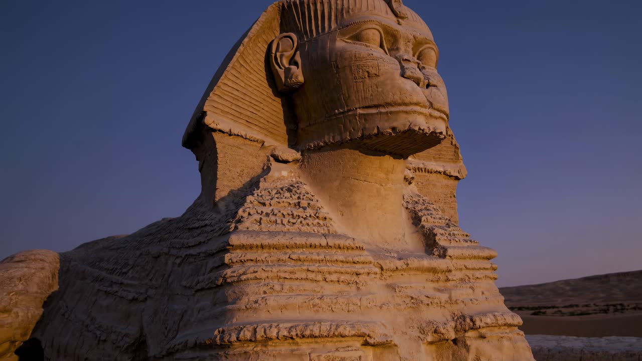 A video still of the Sphinx at sunset, captured from a low angle
