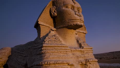a video still of the sphinx at sunset, captured from a low angle