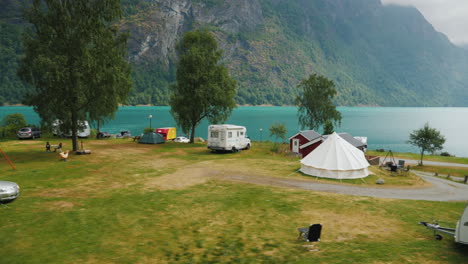 go along the campsite on the shore of the fjord in norway