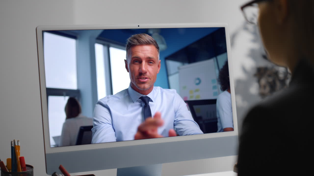 Employee have online negotiations at office computer close up. Video conference