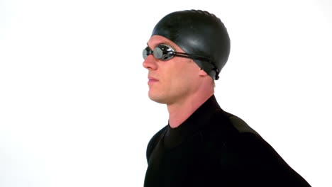 Serious-swimmer-with-wet-suit-standing