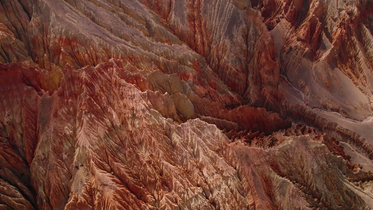 Immerse in the allure of Upper Mustang, Nepal, as a drone explores the unique, scary, and artistically structured orange-red dry mountains. Annapurna Area reveals its captivating beauty