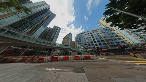 kwun tong redevelopment, motion timelapse of kwun tong hip wo street new bridge, new and old buildings, tong lau