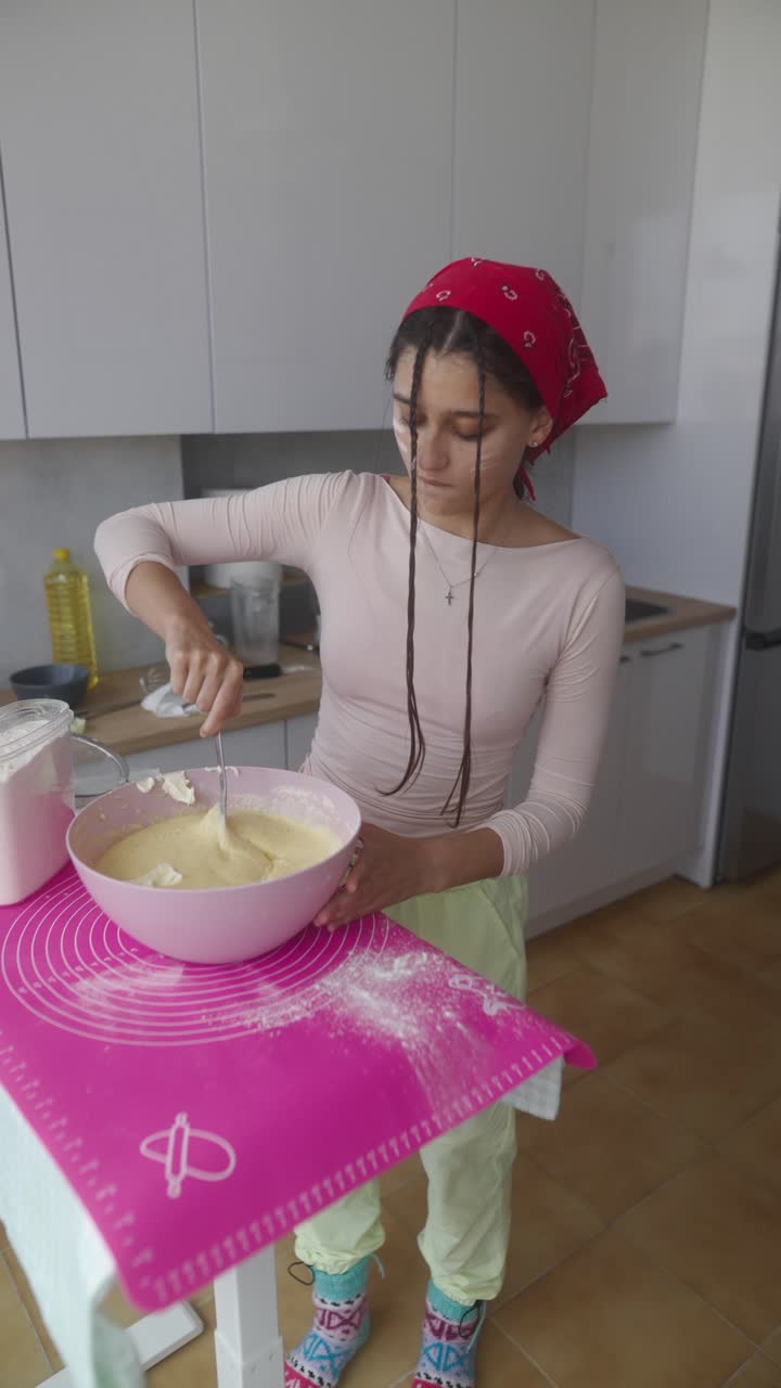 Teenage girl baking