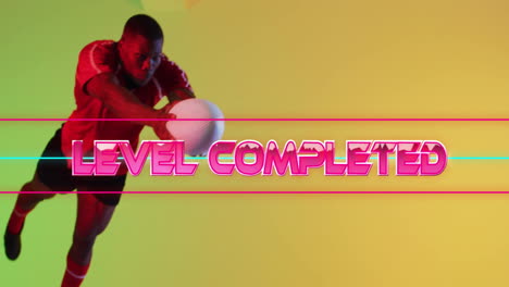 animation of level completed over african american male rugby player on yellow background