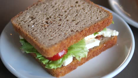 delicious whole-wheat sandwich with feta cheese and lettuce