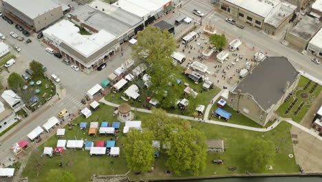 aerial - booths during dogwood festival, siloam springs, ar, truck left