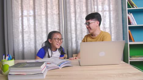 father and daughter learning together at home