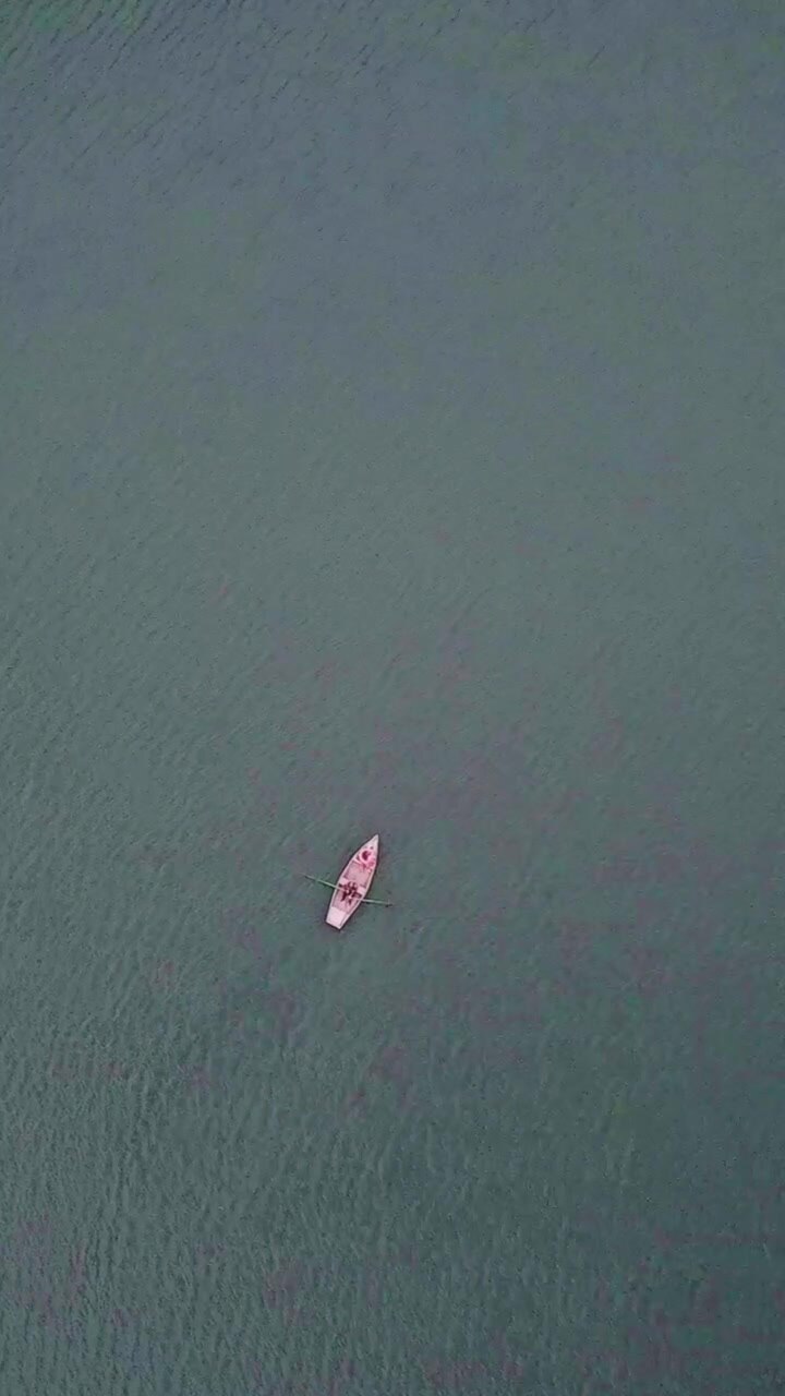 Rowboat on a Calm Lake