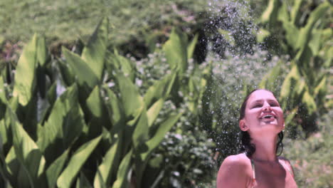 woman taking a shower in slow motion