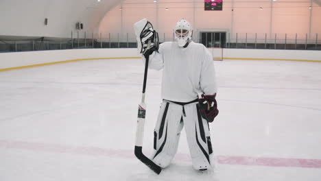 Portrait Of Goalie On Ice Rink