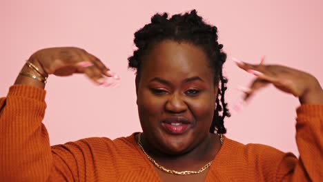 afro-american plump woman model dances posing moving hands