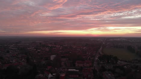Sunset-view-from-a-drone-with-few-birds-flying-in-the-sky