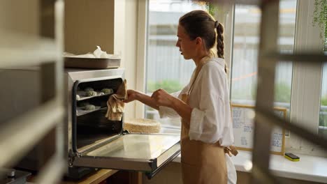 woman baking cookies in a kitchen