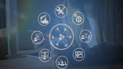 Digital icons moving against man using smartphone