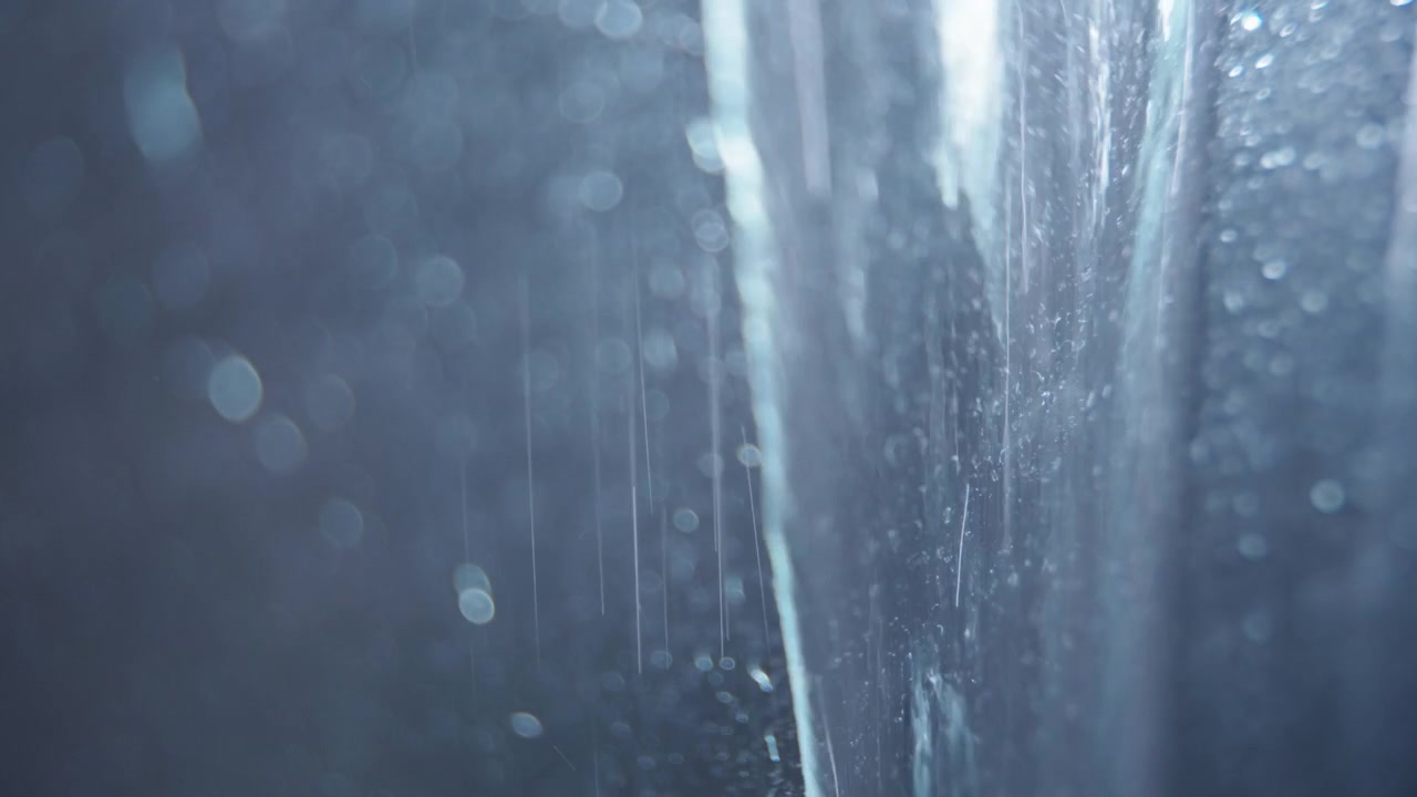Water falling down the glass