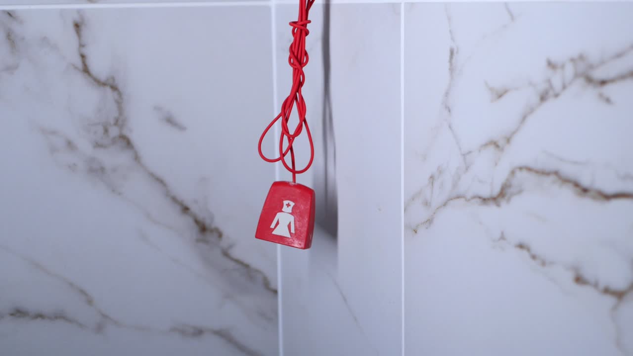 botón de llamada de enfermera rojo