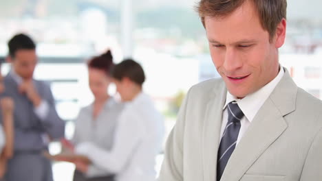 Business-man-working-on-his-tablet-pc