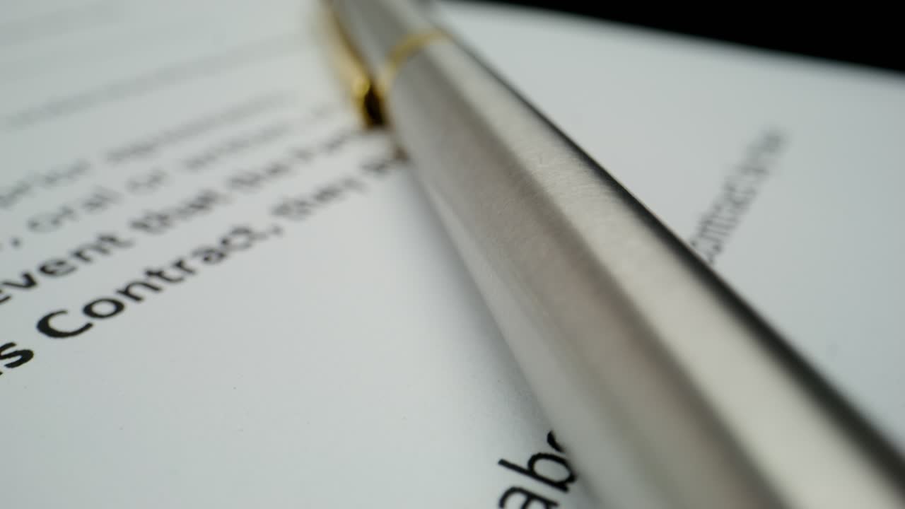 Signed document with pen