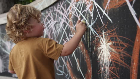 chalk drawing by a toddler outdoors