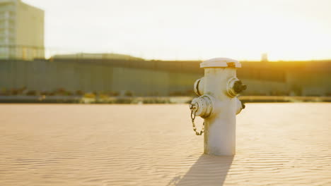 old hydrant on a seaside promenade