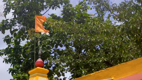 hindu flag on temple om orange maharashtra india marathi